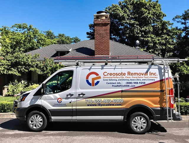 Willoughby Chimney Sweep technician removing creosote safely in Willoughby, OH